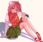  1girl ahoge bandaged_arm bandages bangs blush breasts bun_cover commentary_request cuffs double_bun flower full_body green_skirt hair_bun ibaraki_kasen looking_at_viewer medium_breasts open_mouth pink_eyes pink_hair red_flower red_footwear rose shirt shoes short_hair short_sleeves sitting skirt smile solo tabard touhou tuyu_iro white_background white_shirt 
