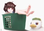  1girl ahoge bangs barefoot bird black_hair blunt_bangs blurry blurry_foreground bob_cut box commentary_request crossed_ankles duck feet foot_focus hair_intakes handheld_game_console headgear highres in_box in_container laundry_basket red_eyes short_hair soles stuffed_toy toes touhoku_kiritan voiceroid white_background yukkuri_bitto 