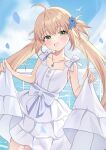  1girl absurdres adachi_(ttriwk) ahoge artoria_caster_(fate) artoria_caster_(over_the_same_sky)_(fate) artoria_pendragon_(fate) bare_shoulders blonde_hair blue_sky breasts commentary dress fate/grand_order fate_(series) flower green_eyes hair_flower hair_ornament highres jewelry long_hair looking_at_viewer necklace ocean open_mouth sky small_breasts smile solo twintails white_dress 