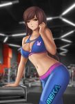  1girl acronym adapted_costume animal_print arm_support bangs blue_pants blue_sports_bra blurry blurry_background breasts brown_eyes brown_hair bunny_print cleavage_cutout clenched_hand clothing_cutout collarbone cowboy_shot d.va_(overwatch) english_commentary exercise_machine facepaint facial_mark flowerxl gym indoors long_hair looking_at_viewer medium_breasts midriff navel no_headwear overwatch pants parted_lips skin_tight solo sports_bra swept_bangs tight tight_pants whisker_markings 