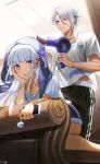  1boy 1girl bangs blue_eyes blue_hair blunt_bangs blush brother_and_sister couch dolphin_shorts genshin_impact hair_dryer hand_in_another&#039;s_hair highres holding holding_phone isobe47 kamisato_ayaka kamisato_ayato long_hair mole mole_under_eye mole_under_mouth on_couch open_mouth pants phone shirt short_sleeves shorts siblings slime_(genshin_impact) towel track_pants white_shirt 