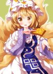  1girl animal_ears between_fingers blonde_hair dress fox_ears hat highres long_sleeves mob_cap ofuda open_mouth pillow_hat ruu_(tksymkw) short_hair solo tabard touhou white_dress white_headwear wide_sleeves yakumo_ran 