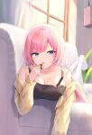  1girl bangs black_shirt blue_eyes breasts brightlight casual cleavage couch elysia_(honkai_impact) food full_body highres holding holding_food honkai_(series) honkai_impact_3rd indoors jacket long_hair long_sleeves looking_at_viewer lying no_shoes on_stomach open_clothes open_jacket open_mouth pink_hair shirt solo thighhighs white_thighhighs window yellow_jacket 