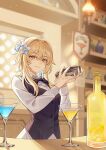  1girl bartender blonde_hair bottle cocktail cocktail_glass cocktail_shaker collared_shirt cup drink drinking_glass employee_uniform flower genshin_impact hair_flower hair_ornament highres indoors light_particles long_hair long_sleeves lumine_(genshin_impact) necktie pouring shirt sleepy1292673668 smile uniform vest yellow_eyes 