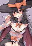  1girl akahi242 black_cape black_hair black_headwear breasts brown_eyes cape cleavage closed_mouth cowboy_shot hair_between_eyes hair_ornament hairclip halloween halloween_costume haruna_(kancolle) hat highres kantai_collection large_breasts long_hair looking_at_viewer navel smile solo tongue tongue_out torn_cape torn_clothes witch_hat 