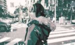  1girl blurry blurry_foreground building car chainsaw_man champi fur_collar greyscale ground_vehicle hair_between_eyes highres hood hoodie jacket looking_to_the_side monochrome motor_vehicle muted_color palm_tree reze_(chainsaw_man) road snowing solo starbucks street tree 