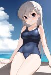  1girl blue_eyes blue_one-piece_swimsuit blue_sky breasts cloud commentary_request covered_navel cowboy_shot grey_hair highres hisakawa_hayate horizon idolmaster idolmaster_cinderella_girls long_hair looking_at_viewer medium_breasts ocean old_school_swimsuit rfeulgen school_swimsuit sitting sky solo swimsuit 