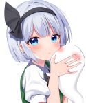  1girl black_hairband black_ribbon blue_eyes blush closed_mouth collared_shirt green_vest grey_hair hair_ribbon hairband highres hitodama konpaku_youmu konpaku_youmu_(ghost) puffy_short_sleeves puffy_sleeves ribbon shinonome_asu shirt short_hair short_sleeves simple_background solo touhou twitter_username upper_body vest white_background white_shirt 