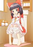  barefoot black_hair bloomers bow feet hair_bow hakurei_reimu highres red_eyes short_hair solo symbol-shaped_pupils toilet toilet_use touhou underwear yamazaki_mitsuru 