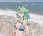 1girl antlers beach bikini bikini_top_only blue_bikini blue_sky breasts ceres_fauna ceres_fauna_(1st_costume) cloud earrings english_commentary flower green_hair hair_flower hair_ornament highres hololive horns jewelry long_hair looking_at_viewer medium_breasts mole mole_under_eye navel o22no outdoors sky solo swimsuit teeth virtual_youtuber waves white_flower yellow_eyes 
