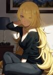  1girl alternate_eye_color arm_behind_head arm_up bare_shoulders black_pants black_shirt blonde_hair breasts cleavage cynthia_(pokemon) desk_lamp fagi_(kakikaki) from_side hair_ornament_removed hair_over_one_eye highres indoors lamp long_hair looking_at_viewer looking_to_the_side medium_breasts nightstand off-shoulder_shirt off_shoulder pants parted_lips picture_frame pokemon pokemon_(game) pokemon_dppt shirt sitting solo very_long_hair yellow_eyes 