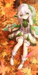  1girl absurdres armlet autumn autumn_leaves bare_shoulders blurry blurry_foreground bracer colored_tips commentary cross-shaped_pupils day dress falling_leaves feet full_body gem genshin_impact gold_trim gradient_hair green_eyes green_gemstone green_hair hair_ornament highres leaf leaf_hair_ornament looking_at_viewer maple_leaf multicolored_hair nahida_(genshin_impact) no_shoes outdoors pointy_ears ponytail shorts side_ponytail sitting sleeveless sleeveless_dress socks solo stirrup_legwear thighs toeless_legwear toes toi1et_paper tree two-tone_hair white_dress white_hair white_shorts white_socks 