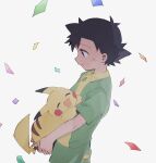  1boy absurdres ash_ketchum bangs black_hair closed_mouth commentary_request confetti from_side green_shirt green_shorts highres holding holding_pokemon kurage2535 male_focus pikachu pokemon pokemon_(anime) pokemon_(classic_anime) pokemon_(creature) shirt short_hair short_sleeves shorts simple_background smile white_background 
