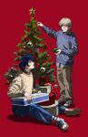  2boys ^_^ absurdres arm_up between_legs blonde_hair blue_pants blue_sweater blush box box_stack brown_pants brown_shirt brown_sweater chinese_commentary christmas_stocking christmas_tree christmas_tree_ornament closed_eyes commentary_request decorating_christmas_tree erhuazi917 full_body gift ginga_eiyuu_densetsu green_ribbon grin highres holding holding_box holding_gift holding_ornament julian_mintz layered_sleeves long_sleeves male_focus multiple_boys pants profile red_background ribbon shirt shoelaces shoes simple_background sitting smile sneakers socks standing star_(symbol) striped_clothes striped_socks sweater tassel teeth white_shoes white_socks yang_wen-li 