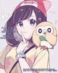  1girl beanie black_hair blue_eyes closed_mouth floral_print hat highres looking_at_viewer pokemon pokemon_(creature) pokemon_sm red_hat rowlet selene_(pokemon) shirt short_hair short_sleeves tere_asahi upper_body v yellow_shirt z-ring 