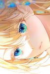  1girl 58_(opal_00_58) blonde_hair blue_eyes blue_gemstone blurry blurry_foreground close-up closed_mouth commentary depth_of_field earrings english_commentary exif_rotation eye_focus gem glint highres jewelry lips original portrait revision solo 