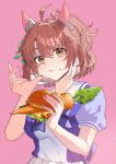  1girl :t absurdres ahoge animal_ears blush breasts brown_eyes brown_hair burger carrot commentary_request dantsu_flame_(umamusume) ear_covers eating food food_on_face higeji_(higeji404) highres holding holding_burger holding_food horse_ears horse_girl large_breasts medium_hair multicolored_hair pink_background puffy_short_sleeves puffy_sleeves purple_shirt sailor_collar sailor_shirt school_uniform shirt short_sleeves simple_background solo streaked_hair tracen_school_uniform umamusume upper_body white_sailor_collar white_streaks 