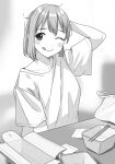  1girl blurry blurry_background blush box chopsticks depth_of_field doushimasho greyscale highres indoors long_sleeves messy messy_hair monochrome open_box original shirt short_hair sitting solo table tongue tongue_out unkempt 