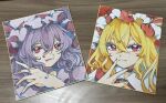  2girls :3 ascot blonde_hair blue_choker choker closed_mouth collared_shirt commentary_request fangs fangs_out fingernails flandre_scarlet frilled_shirt_collar frills hair_between_eyes hat highres licking_lips long_fingernails long_hair looking_at_viewer mob_cap multiple_girls photo_(medium) pink_hat pink_shirt portrait purple_hair purple_nails red_choker red_eyes red_nails red_vest remilia_scarlet sharp_fingernails shikishi shirt siblings sisters smile tongue tongue_out touhou traditional_media uchisaki_himari vest white_hat yellow_ascot 