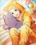  1boy animal_ears balloon collarbone fingernails grey_hair hood hoodie idolmaster idolmaster_side-m idolmaster_side-m_growing_stars long_sleeves male_focus multicolored_hair nekoyanagi_kirio official_art orange_pajamas pajamas pillow pink_hair smile stuffed_animal stuffed_cat stuffed_toy teeth third-party_source undershirt upper_teeth 