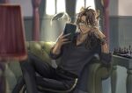  1boy animal_ears black_pants black_shirt blurry blurry_background blurry_foreground book bracelet cat_ears chair chessboard crossed_legs glasses green_eyes highres indoors jewelry lamp leona_kingscholar light long_hair male_focus pants rum_94 shirt sitting solo twisted_wonderland window 