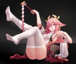  1girl absurdres animal_ears arm_up armpits bangs black_background blush breasts feet feet_up fox_ears full_body genshin_impact hair_ornament highres holding holding_wand japanese_clothes leaning_back legs long_hair looking_at_viewer medium_breasts miko no_shoes open_mouth panties pantyshot parted_lips pink_hair purple_eyes sideboob sitting soles solo t_zhonglang thighhighs thighs toes underwear wand white_panties white_thighhighs yae_miko 