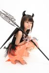  1girl asian axe barefoot child cosplay demon_girl feet halberd highres horns japanese photo polearm simple_background skirt solo source_request weapon wings young younger 