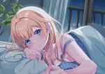  1girl absurdres aizawa_ema bed blonde_hair blue_eyes collarbone commentary curtains gekka_(luna_gekka) hair_intakes highres long_hair looking_at_viewer lying night nightgown on_stomach pillow plant smile solo strap_slip virtual_youtuber vspo! window 