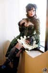  against_wall asian big_breasts boots breasts cleavage cosplay fan large_breasts photo yaya_han 