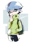  1boy bangs black_shorts blue_eyes blue_hair blunt_bangs commentary_request copyright_name cowboy_shot cropped_legs earphones english_text green_jacket hand_in_pocket hand_up high_collar ink_tank_(splatoon) inkling inkling_boy jacket long_sleeves looking_at_viewer male_focus parted_lips pointy_ears sentinel_ga_koku_ni_aru shiny shiny_hair short_hair short_shorts shorts solo splatoon_(series) standing 