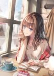  1girl arm_support bangs blue_eyes blush book brown_hair cake closed_mouth coffee coffee_mug cup food hand_up highres indoors jewelry long_hair long_sleeves looking_at_viewer morigami_(morigami_no_yashiro) mug necklace original plate sitting smile solo sweater table white_sweater window 