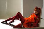  bodysuit cosplay latex latex_suit long_hair lying mirror neon_genesis_evangelion photo plugsuit real red_hair reflection shikinami_asuka_langley soryu_asuka_langley souryuu_asuka_langley ushijima ushijima_iiniku 