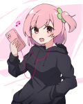  1girl :d assault_lily bangs beamed_eighth_notes black_hoodie blush breasts cellphone clover commentary drawstring earbuds earphones four-leaf_clover hand_in_pocket hand_up highres hitotsuyanagi_riri holding holding_phone hood hood_down hoodie listening_to_music long_sleeves looking_at_viewer medium_breasts musical_note one_side_up open_mouth phone pink_background pink_eyes pink_hair pocket short_hair smartphone smile solo standing teeth two-tone_background upper_body upper_teeth white_background yubari_lemon_(lemonlilie) 