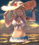  1girl animal_ears armlet avatar_(ff14) bead_bracelet beads bikini blonde_hair blue_nails blue_sarong blue_sky bracelet breasts cat_ears cloud commentary day final_fantasy final_fantasy_xiv flower front-tie_bikini_top front-tie_top green_eyes grin hair_flower hair_ornament hand_on_headwear hands_up hat hat_flower hibiscus highres jewelry large_breasts looking_at_viewer medium_hair midriff miqo&#039;te nail_polish navel ocean outdoors potion_lilac sarong sky slit_pupils smile solo standing straight-on sun_hat sunlight swimsuit upper_body wading water wet white_bikini white_flower 