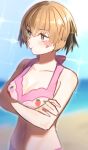  1girl beach bikini blonde_hair blush_stickers cocoro_mimi71 crossed_arms fate/grand_order fate_(series) food_print gareth_(fate) gareth_(swimsuit_saber)_(fate) gareth_(swimsuit_saber)_(second_ascension)_(fate) green_eyes highres pink_bikini pout short_hair sparkle strawberry_print swimsuit 