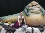  1girl alien asian cosplay fruit_bowl highres jabba_the_hutt japanese leia_organa no_bangs pipe princess_leia princess_leia_organa_solo princess_leia_organa_solo_(cosplay) slave smoking_pipe star_wars 