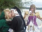  armor blonde_hair cosplay dark_link dual_persona hat kiss link multiple_girls nintendo photo pointy_ears princess_zelda the_legend_of_zelda the_legend_of_zelda:_ocarina_of_time the_legend_of_zelda:_twilight_princess tunic white_hair 