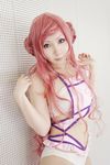  blue_eyes code_geass cosplay double_bun euphemia_li_britannia hair_buns long_hair midriff photo pink_hair solo standing swimsuit tatsuki 