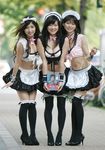  3girls asian bow bowtie breasts cleavage happy heels high_heels idol leaning_forward leggings maid midriff multiple_girls photo real shoes smile 