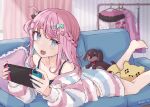  1girl couch hair_ornament highres jacket long_hair looking_at_viewer multicolored_hair nintendo_switch on_couch open_mouth pink_hair smile sugar_7g tulsi_nightmare vee_(vtuber) virtual_youtuber 