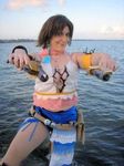  beach breasts brown_hair cleavage cosplay final_fantasy gun gunner yuna 