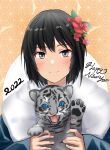  1girl 2022 amagami animal animal_hands bangs black_hair blue_eyes blue_kimono blush brown_background brown_eyes cat cat_paws close-up closed_mouth commentary dated english_text fangs flower fur hair_flower hair_ornament happy_new_year highres holding holding_animal holding_cat japanese_clothes kimono light_smile long_sleeves looking_at_viewer nanasaki_ai new_year open_mouth patterned_background pawpads portrait red_flower short_hair smile solo tiger tiger_cub white_fur yoo_tenchi 