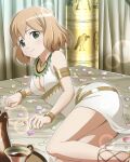  1girl alternate_costume amelie_planchard artist_request bare_shoulders bed blonde_hair blush breasts cleavage closed_mouth egyptian_clothes green_eyes highres indoors looking_at_viewer lying medium_breasts official_art on_bed on_side petals shiny shiny_hair short_hair smile solo strike_witches tea_set world_witches_series 