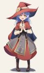  1girl bangs blue_hair blunt_bangs boots capelet full_body hat highres large_buttons long_sleeves looking_at_viewer medium_hair ogami_kazuki open_mouth original simple_background smile solo standing steepled_fingers tachi-e witch witch_hat yellow_eyes 