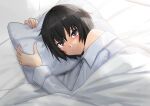  1girl amagami bangs bed_sheet black_hair blush brown_eyes closed_mouth commentary dress_shirt from_above hair_between_eyes highres holding holding_pillow looking_at_viewer looking_up lying naked_shirt nanasaki_ai nose_blush on_side pillow shirt short_hair single_bare_shoulder smile solo under_covers upper_body white_shirt yoo_tenchi 