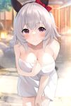  1girl animal_ears breasts cleavage closed_mouth commentary_request cowboy_shot curren_chan_(umamusume) grey_hair highres horse_ears horse_girl large_breasts leaning_forward naked_towel onsen purple_eyes smile solo towel umamusume zeatto 