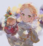  1girl bangs blurry blurry_background braid brown_gloves character_doll christmas_tree doll fur_collar gloves green_eyes grin heart highres holding holding_doll long_sleeves looking_at_viewer master_sword outdoors parted_bangs pointy_ears princess_zelda rain_rkgk shiny shiny_hair smile snow solo teeth the_legend_of_zelda the_legend_of_zelda:_breath_of_the_wild the_legend_of_zelda:_tears_of_the_kingdom triforce_print upper_body winter 