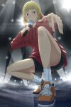  1girl bangs black_shorts blonde_hair chainsaw_man glint highres holding holding_microphone hood hoodie looking_at_viewer medium_hair microphone rappa red_eyes red_hoodie sawatari_akane_(chainsaw_man) shoes shorts sidelocks slit_pupils sneakers socks solo spotlight squatting stage_lights 