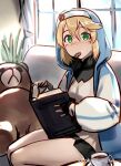  1boy akisa_yositake androgyne_symbol bangs black_gloves black_skirt blonde_hair blue_hoodie blush book bridget_(guilty_gear) commentary_request cookie couch cup dress fingerless_gloves food gloves green_eyes guilty_gear guilty_gear_strive hair_between_eyes holding holding_book hood hood_up hoodie indoors long_sleeves looking_at_viewer male_focus mouth_hold on_couch open_book otoko_no_ko puffy_long_sleeves puffy_sleeves roger_(guilty_gear) seiza sitting skirt solo stuffed_animal stuffed_toy teacup teddy_bear twitter_username yellow_dress 