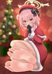  1girl barefoot blue_archive blush christmas christmas_ornaments christmas_tree feet gloves hair_ribbon halo highres hinosaki no_shoes pink_hair red_eyes red_headwear ribbon serina_(blue_archive) soles solo toes 